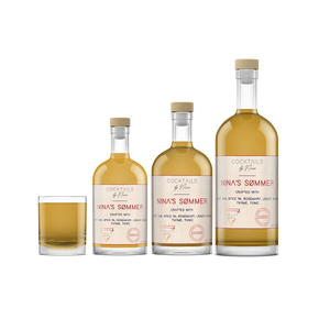 Nina's Sømmers cocktails in three glass bottles, featuring a light amber color and labeled with elegant typography.-Cocktails by Nina